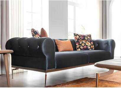 Trīs vietu dīvāns zilo-oranžā audumā