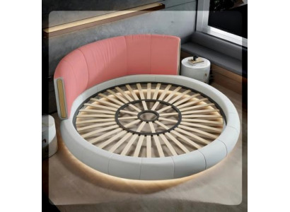 Pelēkbeige apaļā gulta ar modernu ekskluzīvu dizainu guļamistabai