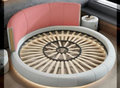 Pelēkbeige apaļā gulta ar modernu ekskluzīvu dizainu guļamistabai