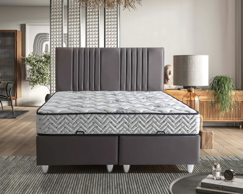 Pelēks auduma gultas ar modernu matraci