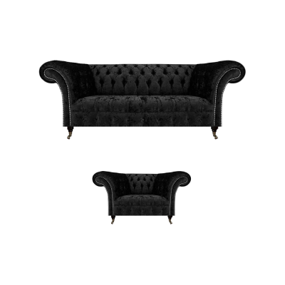 Melns Chesterfield līdz gala apsēstais mēbeļu komplekts - iekārta luksusa dzīvojamajai istabai.