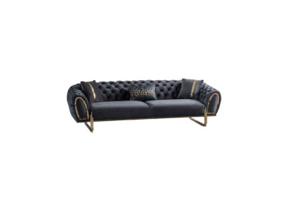 Melns mīksts dīvāns dizaina Chesterfield dzīvojamajai istabai.