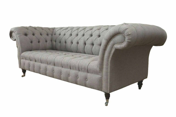 Chesterfield 3 sēdvietu auduma dīvāns modernā stilā pelēkā krāsā.