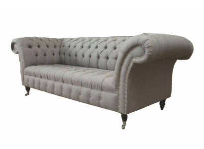 Chesterfield 3 sēdvietu auduma dīvāns modernā stilā pelēkā krāsā.
