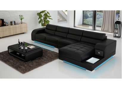Stilīgs dizains. Melnā forma L-sofa elegantai un ērtai atmosfērai.