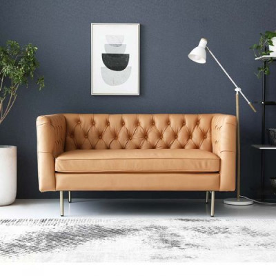 Angļu stila mēbeles Chesterfield divguļamais dīvāns rozā, tirkīza, dzeltenā un zilā krāsā.