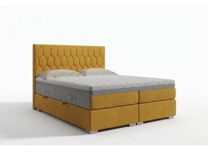 Boxspring gulta viesnīcai divguļamā forma ar luksusa matračiem, polsterētas funkcijas un dzelteno samtu.