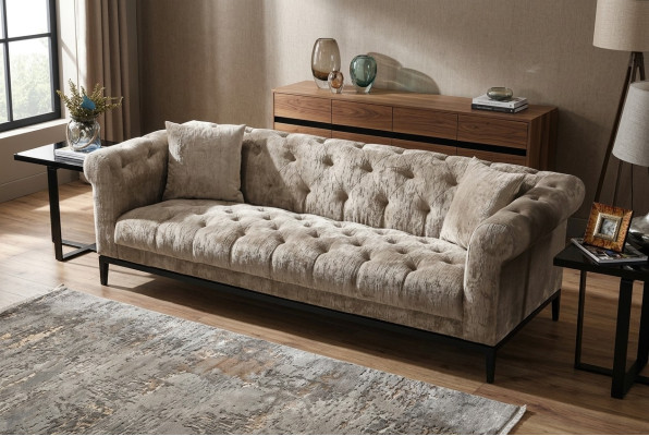 Dzēšamais īpašās kvalitātes Chesterfield dīvāns ar auduma un ādas apdari.