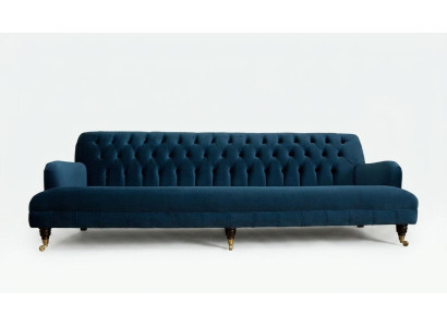 Liels zils Chesterfield četrstāvu xxl luksusa dīvāns ar polsterējumu un mēbelēm.